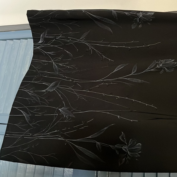 Black formal dress with beaded flower pattern on bottom of skirt - Picture 2 of 4